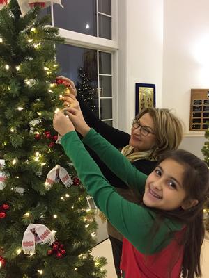 UHEC fans decorating Christmas tree