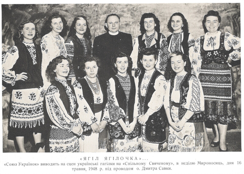 Caption translation: "Iahil Iahilochka [lyrics of a spring ritual song]", "'Ukrainian Women's League' performs Ukrainian <a href="https://en.wikipedia.org/wiki/Vesnianky">'hahilky'</a> at the parish joint Easter meal ('sviachene') on the <a href=https://en.wikipedia.org/wiki/Myrrhbearers#Liturgical_references">Sunday of the Myrrh-Bearers</a>, May 16, 1948 under the direction of Fr. Dmytro Savka."