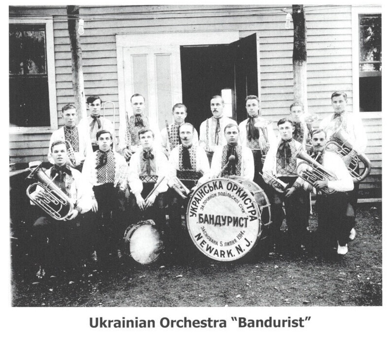 Translation of inscription on bass drum: "Ukrainian Orchestra Banduryst, Newark, N. J. In the order of the Podillia Sich. Founded July 5, 1914."